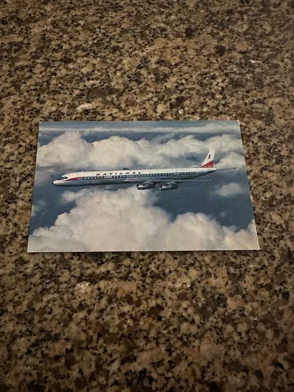 National Douglas DC-8 artistic pre-delivery inflight airline issued postcard