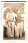 Cowboys with Wooly Chaps Paper Moon Studio Portrait RPPC Stars Guns Holsters