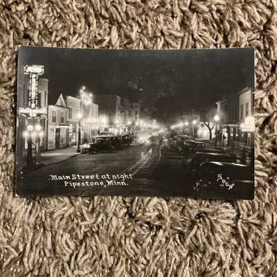 Pipestone MN RPPC View Main Street At Night Ford Hicks Motor Co Shell Sogn Photo