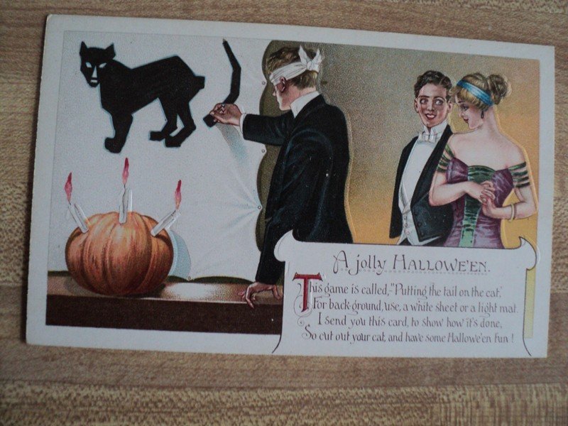 HALLOWEEN Man Playing Pin the Tail on Black Cat vtg. Unknown Embossed Postcard
