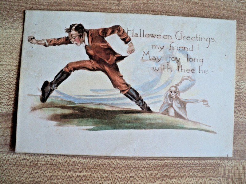 HALLOWEEN Skeletal Ghost chase Man vintage Gibson Art Postcard