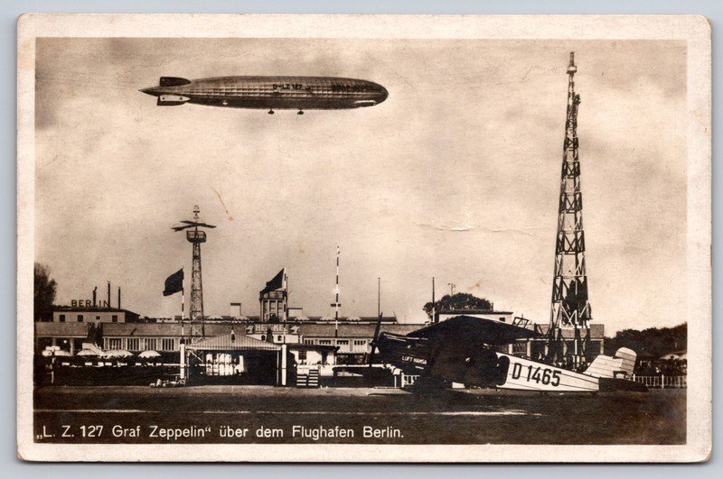 Graf Zeppelin LZ 127 Airship over the Berlin Airport with Luft Hansa Plane RPPC