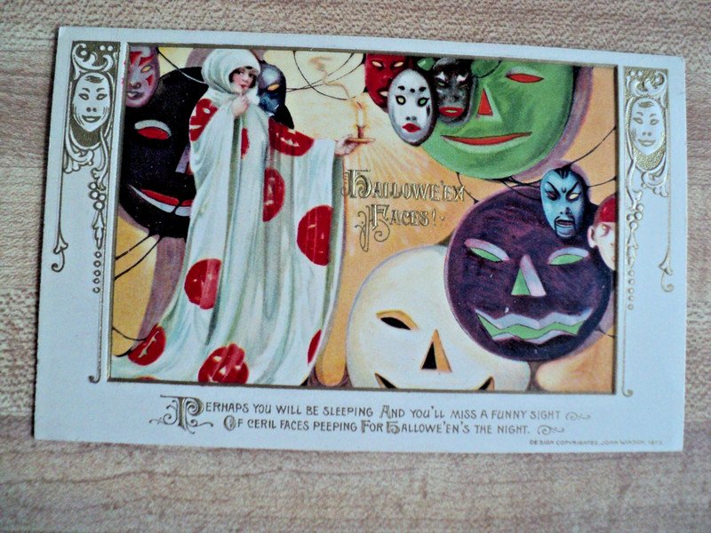 HALLOWEEN Girl & Many Masks vintage John Winsch 1913 Embossed Postcard